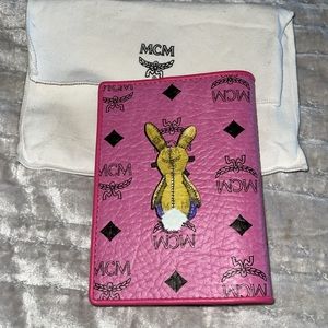 MCM Preloved passport holder excellent condition comes with dust bag only .